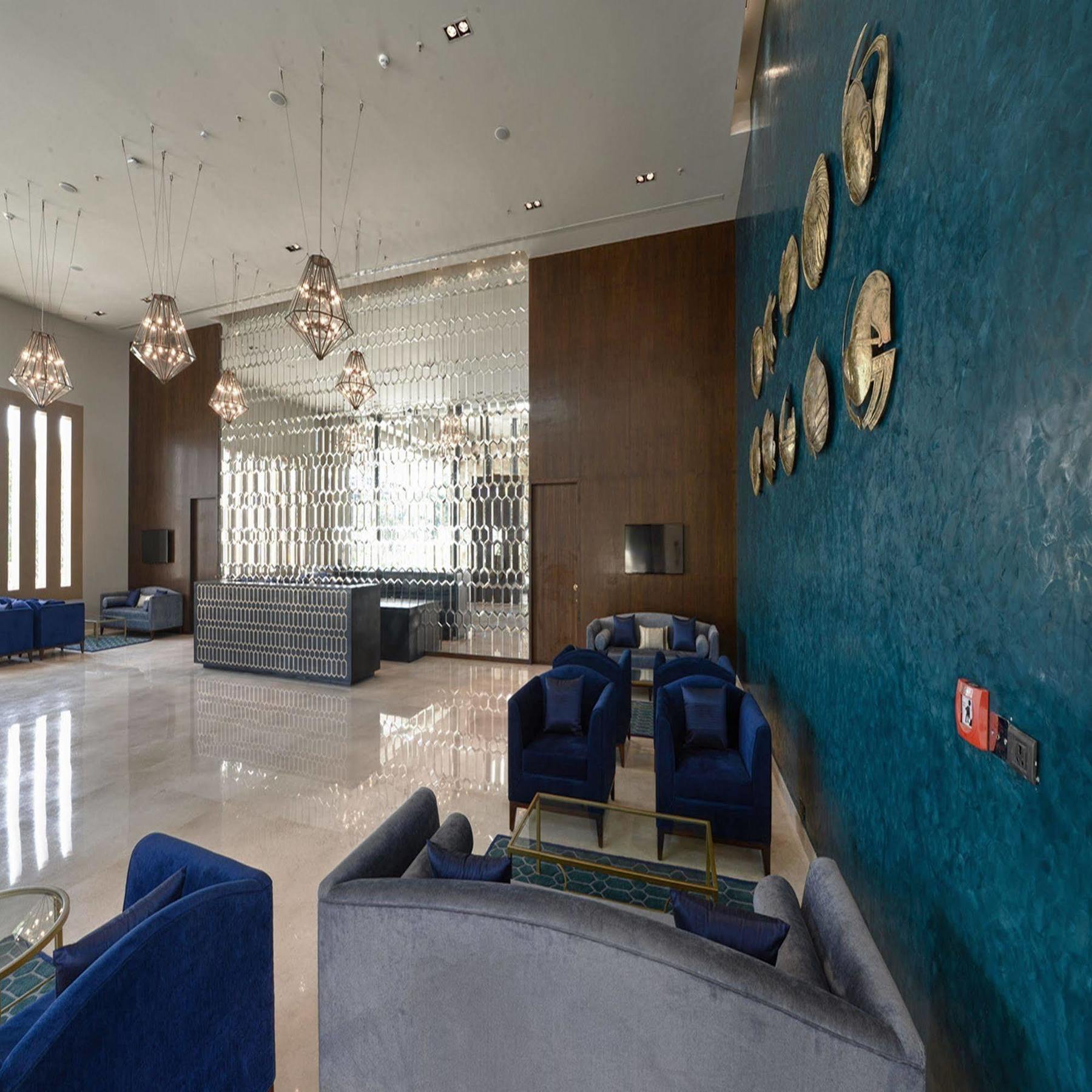 Marasa Sarovar Premiere Tirupati Buitenkant foto The lobby of the hotel